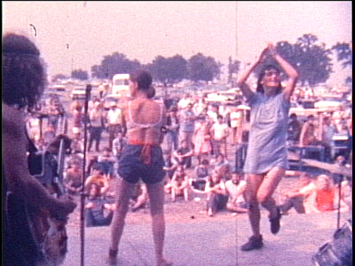 Dancing on stage. - Copyright Charles Burwell