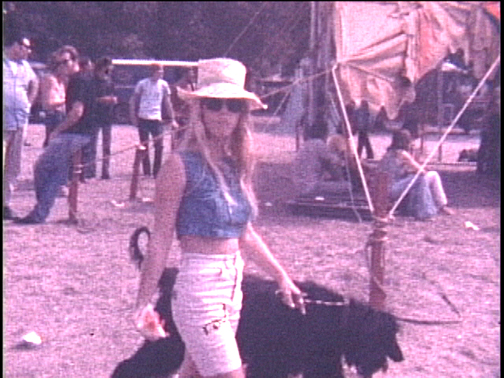 Young lady walking dog. - Copyright Charles Burwell